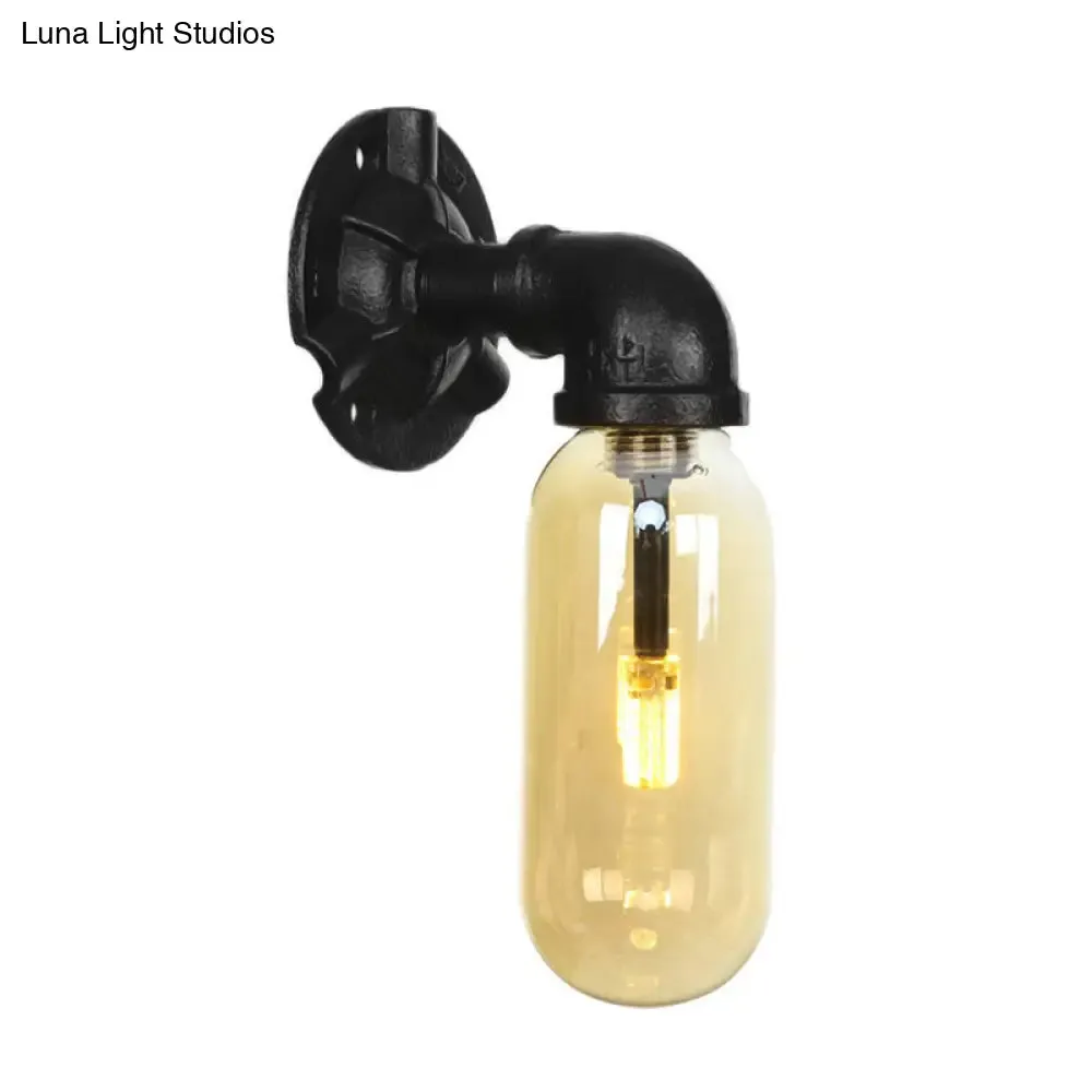 Industrial Amber Glass Wall Sconce with Pipe Design - Black